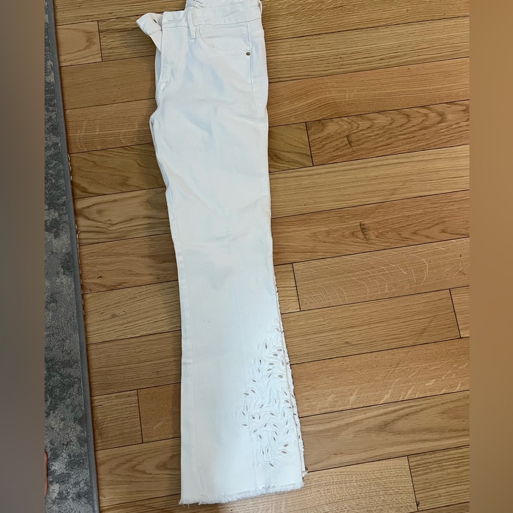 Frame size 25 white le crop mini boot jeans with cutout floral design on bottom